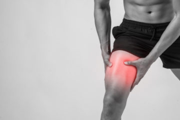 young-sport-man-with-strong-athletic-legs-holding-knee-with-his-hands-pain-after-suffering-ligament-injury-isolated-white_1150-2942